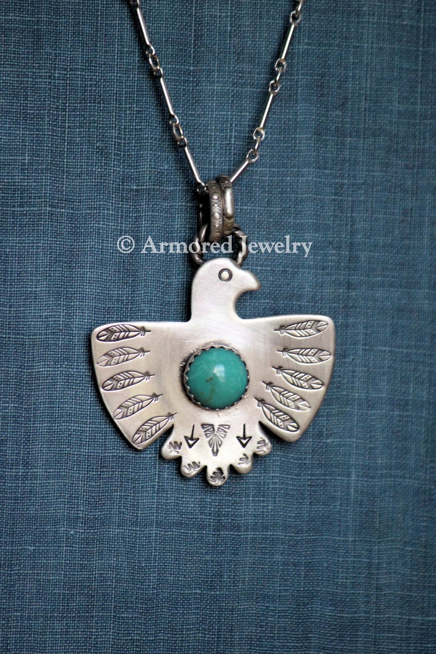Sterling Silver Thunderbird Turquoise Necklace