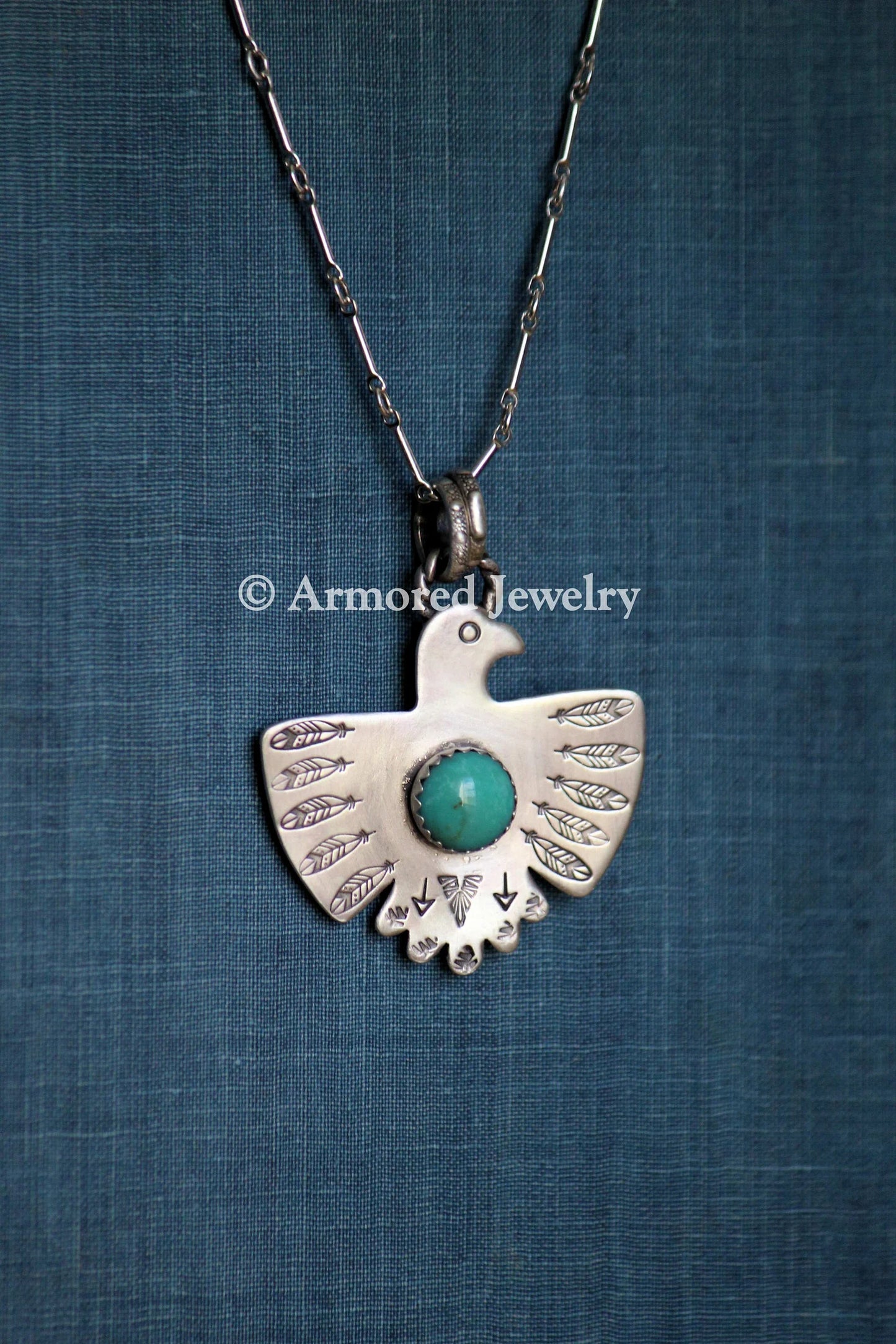 Sterling Silver Thunderbird Turquoise Necklace
