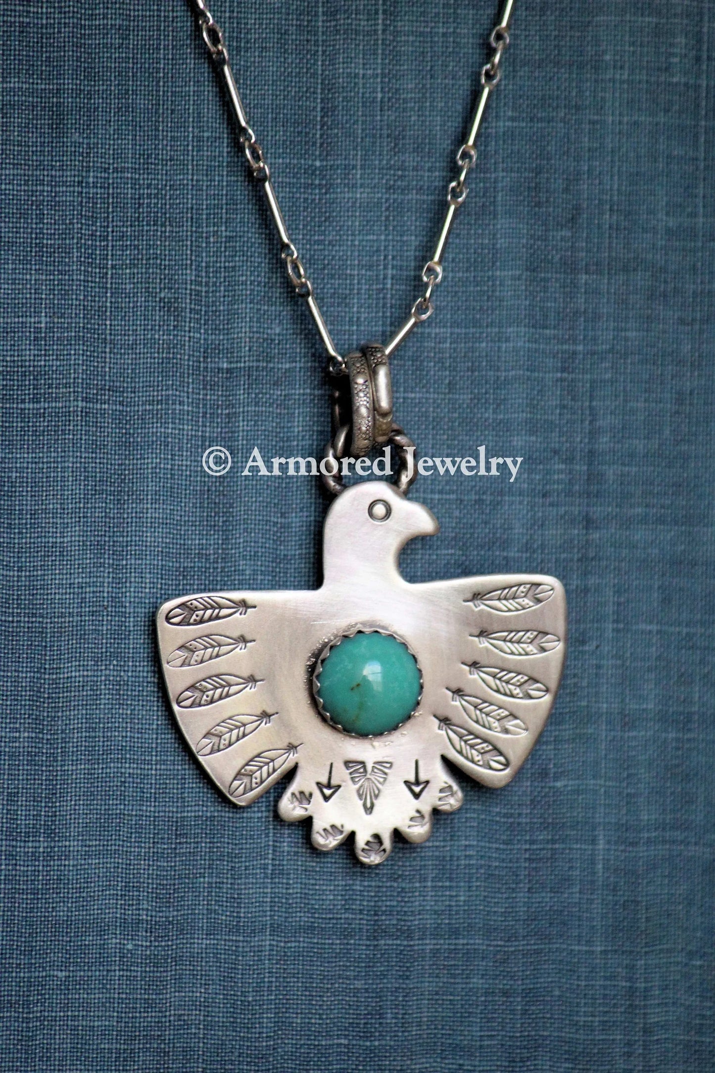 Sterling Silver Thunderbird Turquoise Necklace